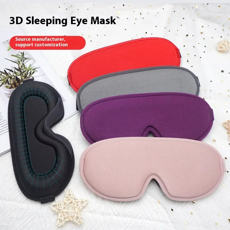 Set of five contoured 3D sleep masks in black, red, gray, purple, and pink with soft fabric textures.